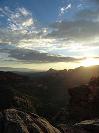 Scenic view of landscape against sky during sunset