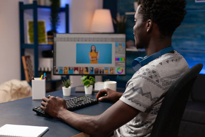 Man using laptop at office