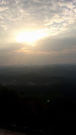 Scenic view of landscape against sky during sunset