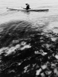 Man sitting in water