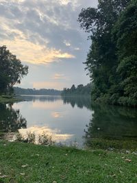 Scenic view of lake against sky during sunset