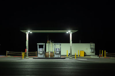 Illuminated street lights at night