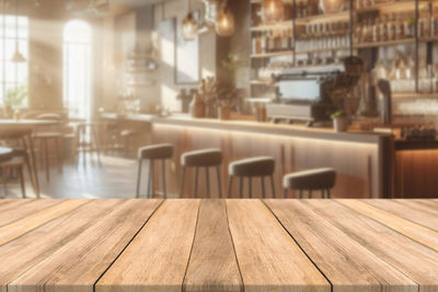 Close-up of wooden table at restaurant