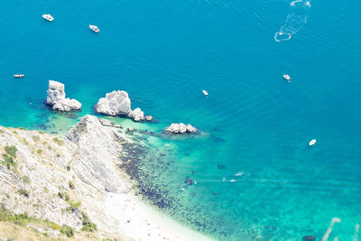 High angle view of sea and rocks