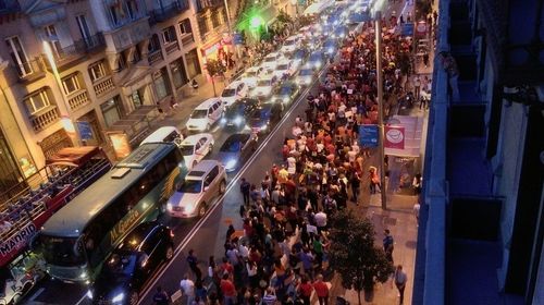 High angle view of crowd on road at night