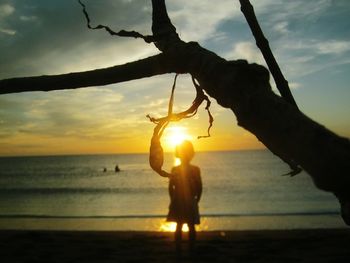 Scenic view of sea at sunset