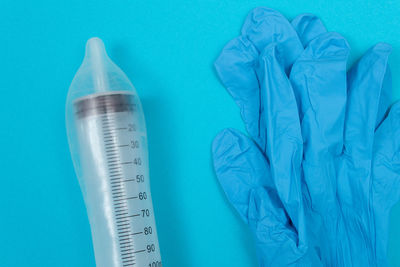 Close-up of blue paint against white background