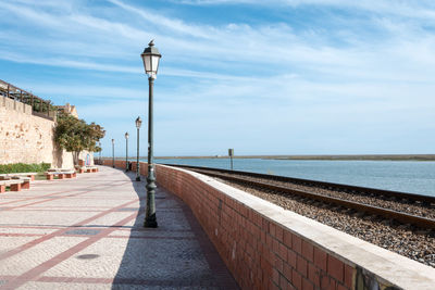 Walkway leading towards sea