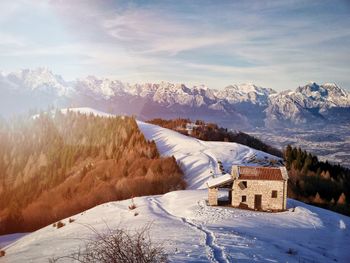 Scenic view of snowcapped mountains against sky