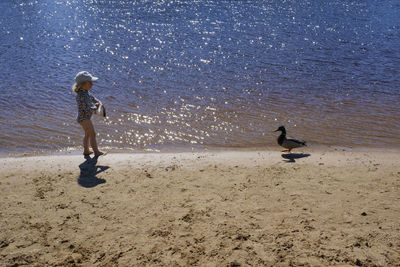Full length of woman on beach