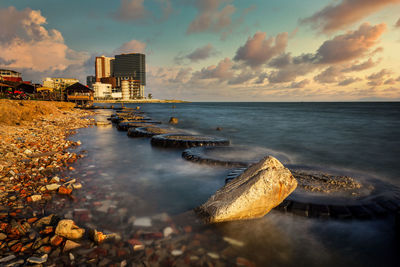 Scenic view of sea against sky during sunset