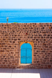 View of sea against clear blue sky