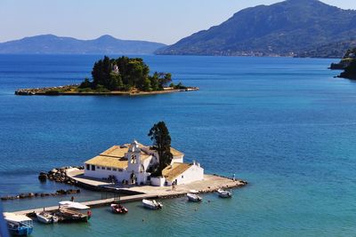 Scenic view of sea and islands against sky