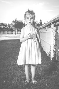 Portrait of girl standing outdoors