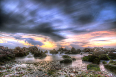 Scenic view of sea at sunset