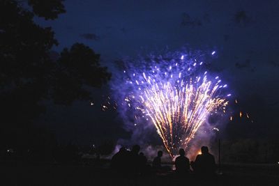 Firework display at night