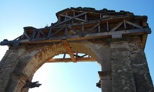 Low angle view of bridge against clear sky