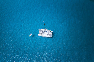 High angle view of sailboat on sea