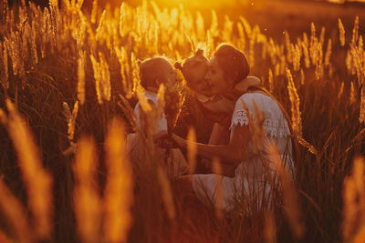 People on field during sunset