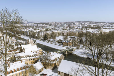 High angle view of snow covered landscape against clear sky