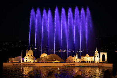 Illuminated building at night