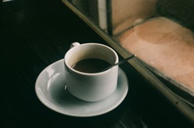 High angle view of coffee cup on table