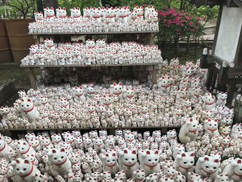 High angle view of figurines for sale in market