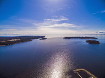 View of calm sea against blue sky