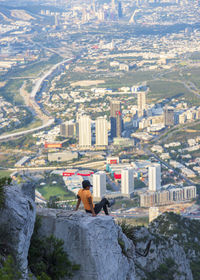 High angle view of man and buildings in city