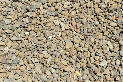 Full frame shot of pebbles on rock