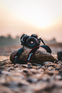 Close-up of camera on rock