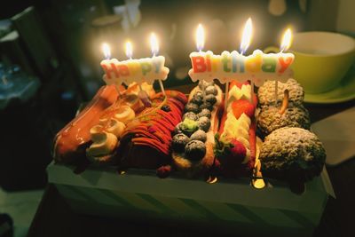 High angle view of birthday candles on dessert