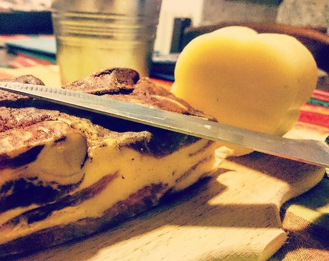 food and drink, food, indoors, still life, freshness, table, healthy eating, close-up, focus on foreground, wood - material, preparation, fruit, slice, yellow, orange color, no people, high angle view, selective focus, indulgence, bread