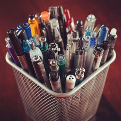 High angle view of objects in container on table