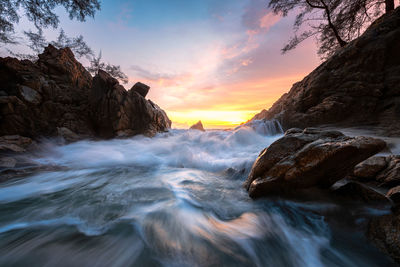 Scenic view of sea against sky during sunset