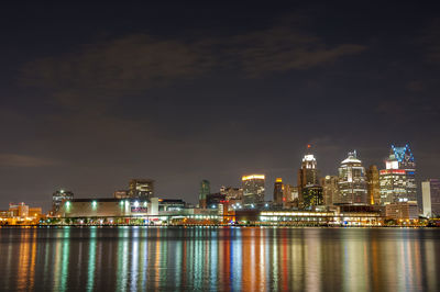 Illuminated city at waterfront