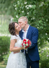 Young couple standing at park