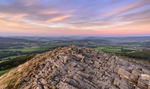 Aerial view of landscape against sky during sunset