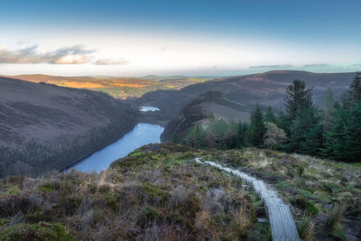 Scenic view of landscape against sky during sunset