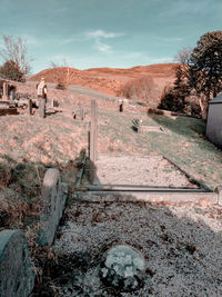 An old cemetery on sunset and hills