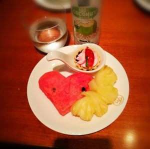 High angle view of fruits in plate on table