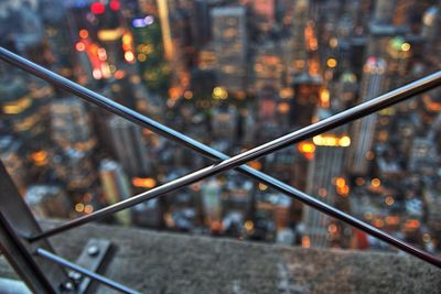 Close-up of railing in city