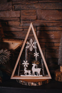 Christmas wooden composition with magic deer. atmospheric festive new year indoor decoration