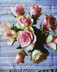 High angle view of roses bouquet on table