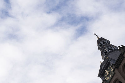 Low angle view of statue of building against sky