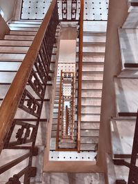 Directly below shot of spiral staircase in building