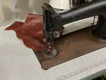 High angle view of sewing machine on table