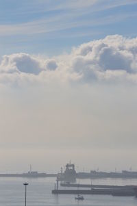 Boats sailing in sea against sky