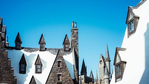 Low angle view of cathedral against clear blue sky