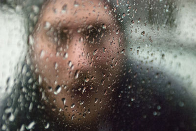 Close-up of wet window in rainy season